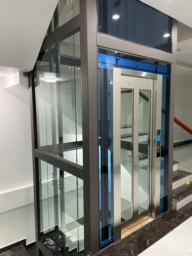 Modern Glass Lift Built into Residential Staircase